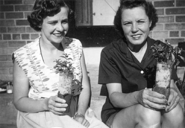 Mrs. Stokes and neighbor with mint juleps on the back stoop – 1955. Courtesy Donald Stokes