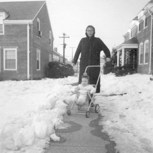 A mother and child outside 4321 S 36th Street in 1960 or 1961.