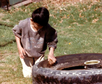 A photo documenting the construction of the Abingdon playground in 1985.