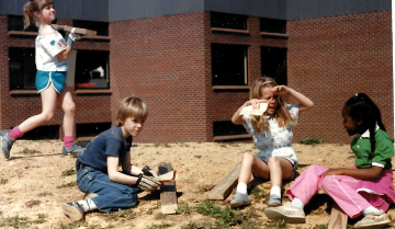 A photo documenting the construction of the Abingdon playground in 1985.