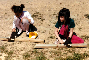 A photo documenting the construction of the Abingdon playground in 1985.