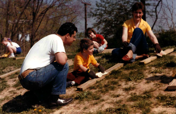 A photo documenting the construction of the Abingdon playground in 1985.