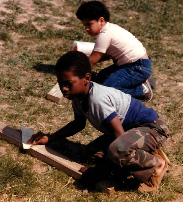 A photo documenting the construction of the Abingdon playground in 1985.