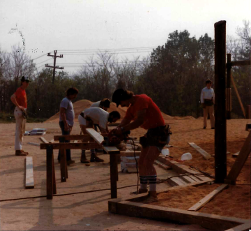 A photo documenting the construction of the Abingdon playground in 1985.