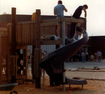 A photo documenting the construction of the Abingdon playground in 1985.