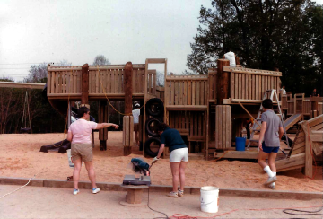 A photo documenting the construction of the Abingdon playground in 1985.