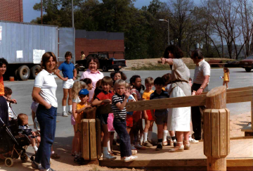 A photo documenting the construction of the Abingdon playground in 1985.