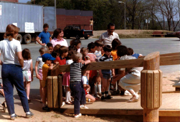 A photo documenting the construction of the Abingdon playground in 1985.